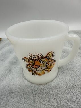 Vintage Fire-King ESSO  “Tiger In Your Tank “
Milk Glass Mug 1960’s